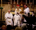 The Bishop blesses the new Priest in Charge